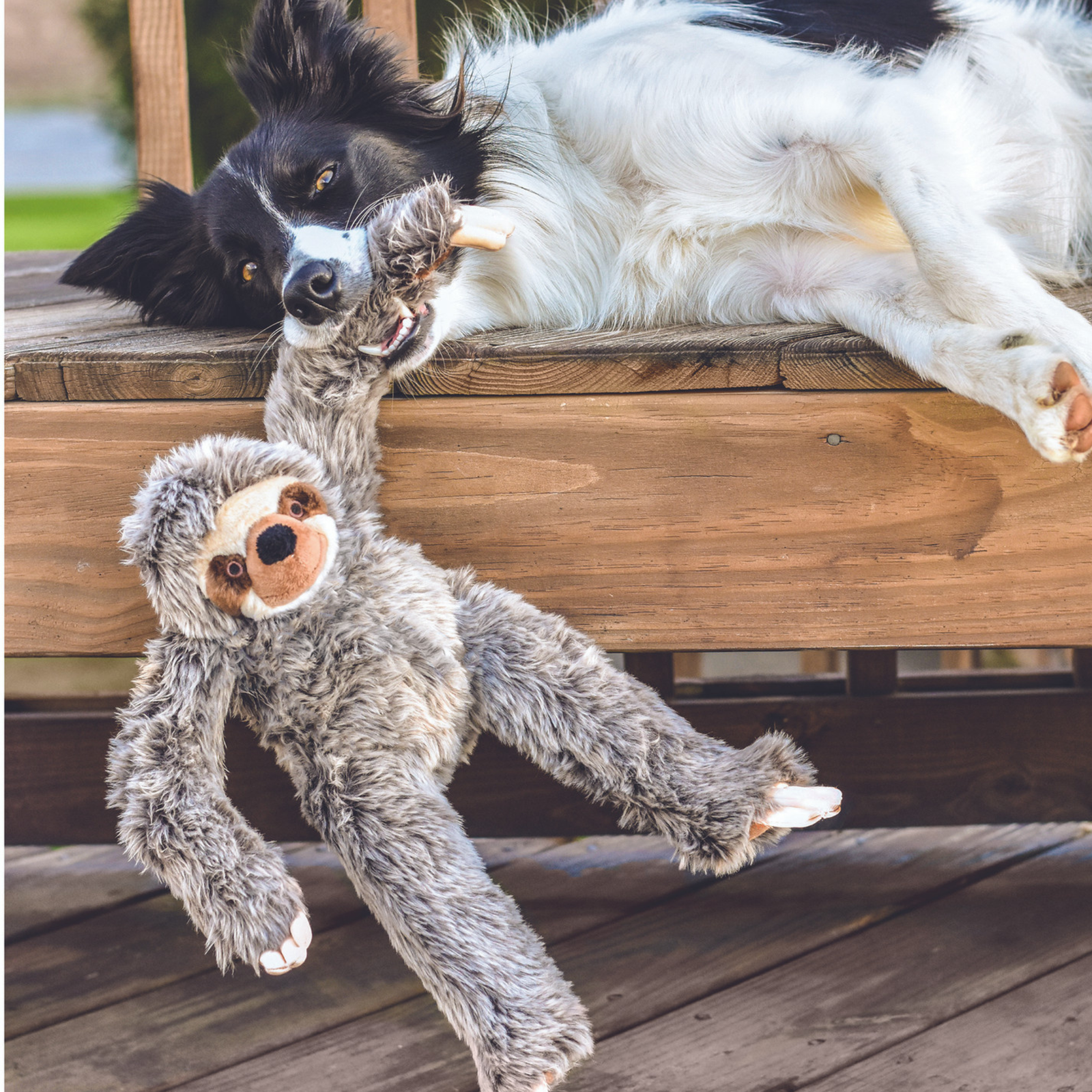Fluff and Tuff Tico Sloth large plush dog toy in grey and cream with long arms on white background