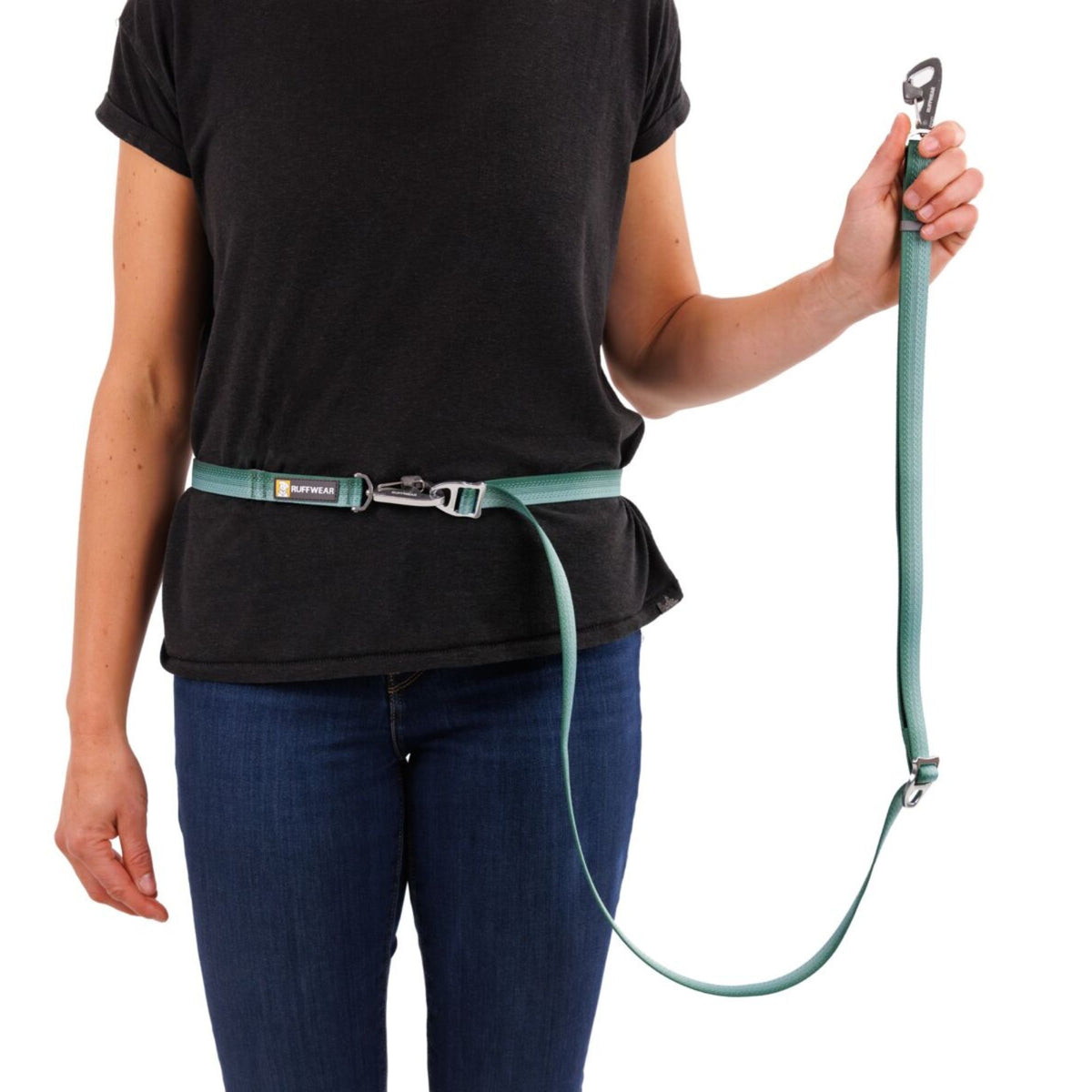 Person wearing Ruffwear Switchbak Double-Ended Dog Lead hand-held in River Rock Green