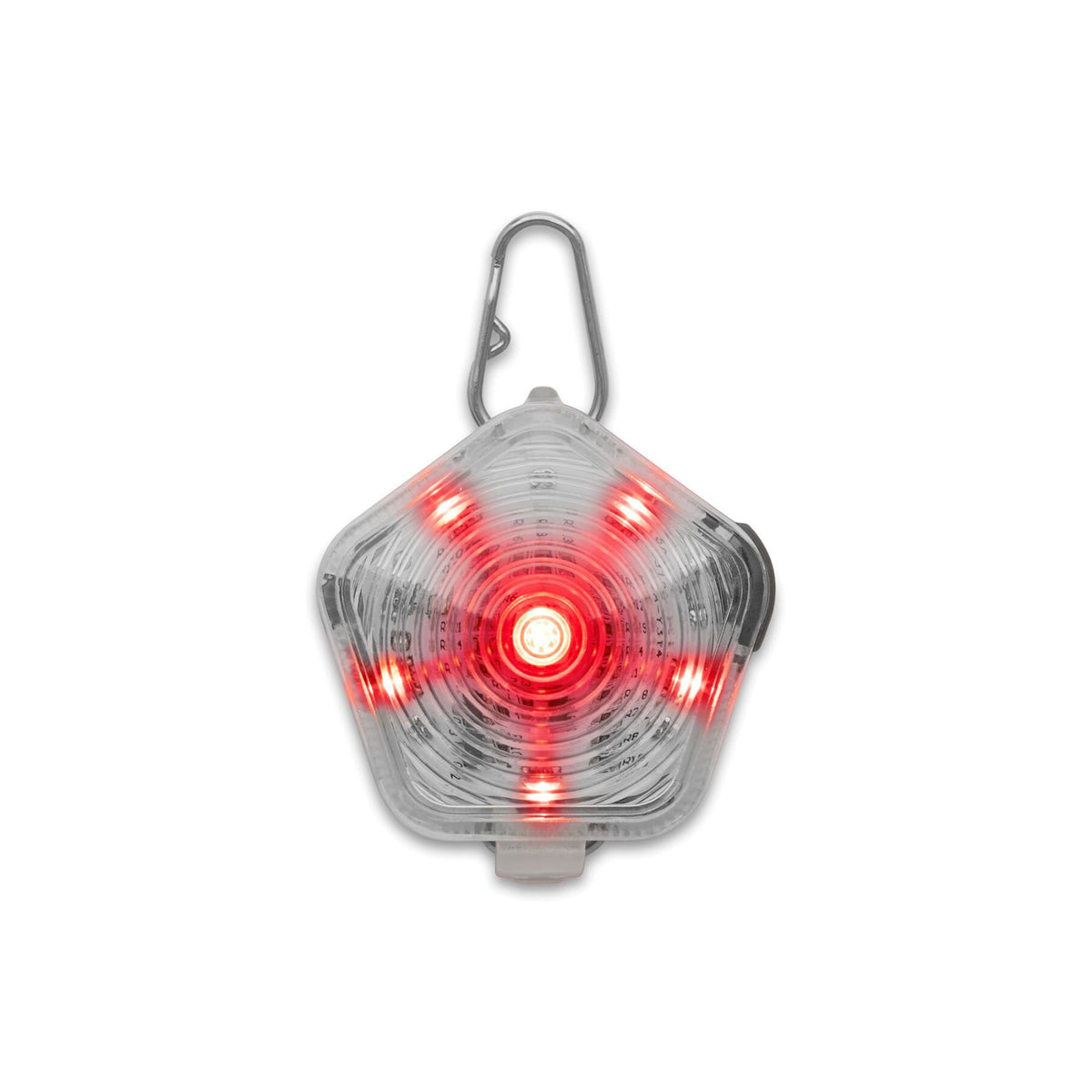 Ruffwear Beacon dog safety light illuminated in red, against a white background showing the full-body glow through the translucent pentagonal shell, stainless steel Quick Clip, and LED pattern radiating from the central lens