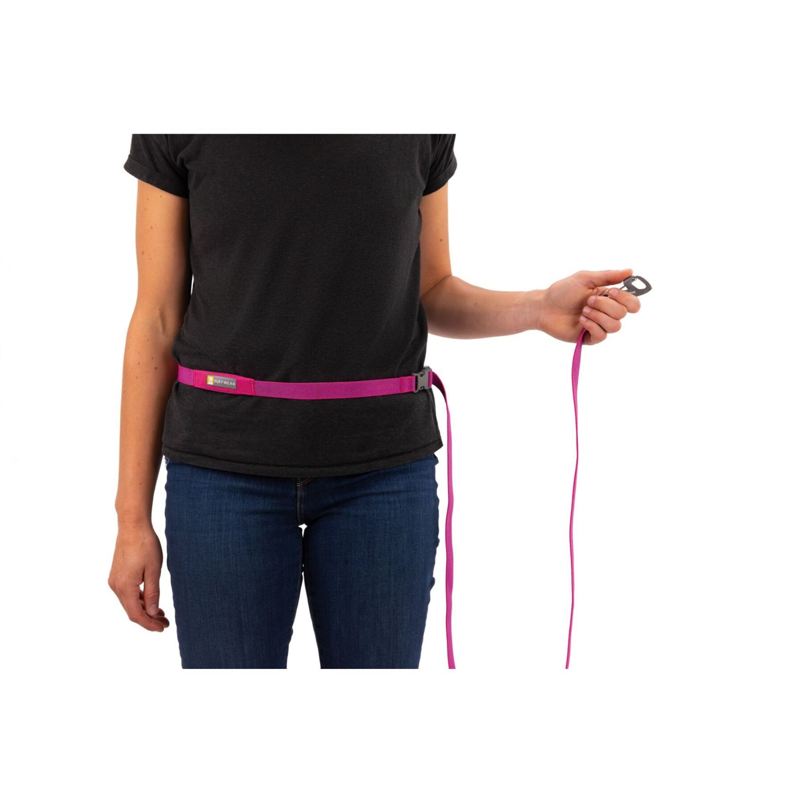 Ruffwear Flagline Dog Lead worn around waist in hands-free configuration in Alpenglow Pink