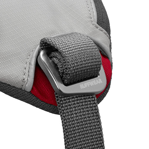 Close-up of the anodized aluminum Doubleback buckle on the Ruffwear Doubleback harness in Cloudburst Gray